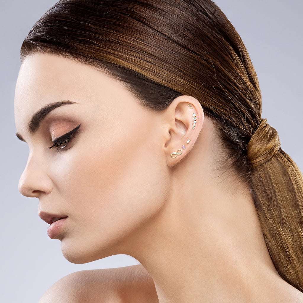 Elevate Your Style: The Art of Stacking with Infinity, CZ, Tourmaline, and Climber Earrings