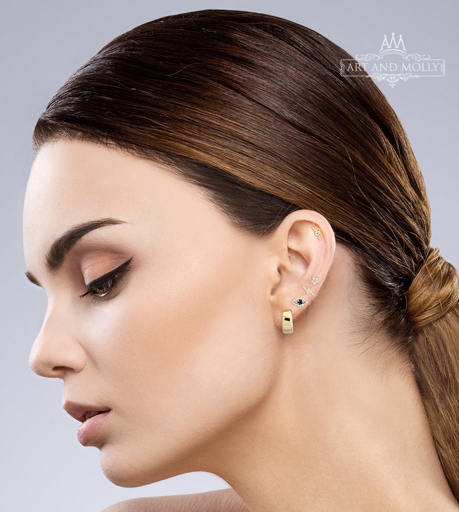 Mystical Marvel: Unleash your Personal Style with a Serpent, Star, Lightning, Evil Eye, and Huggie Hoop Earring Stack